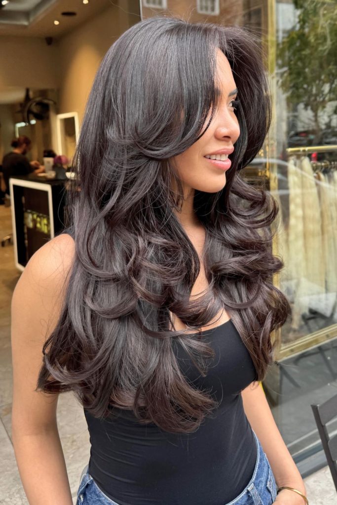 Medium-Long Layers With Curtain Bangs