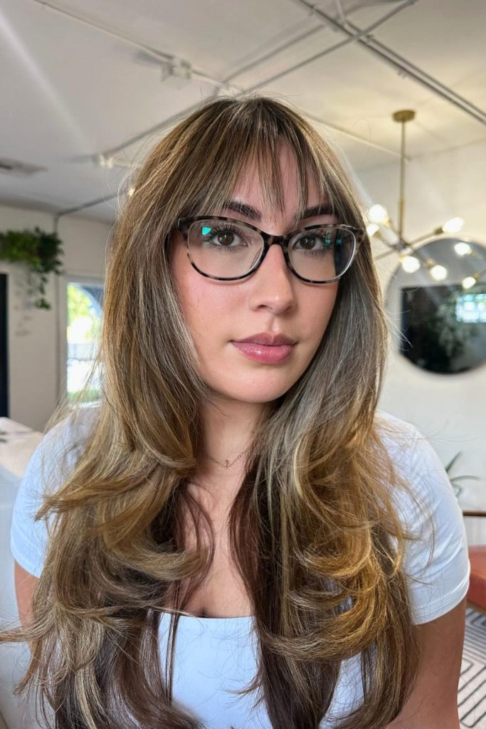 Soft Face-Framing Layers With Wispy Side Bangs