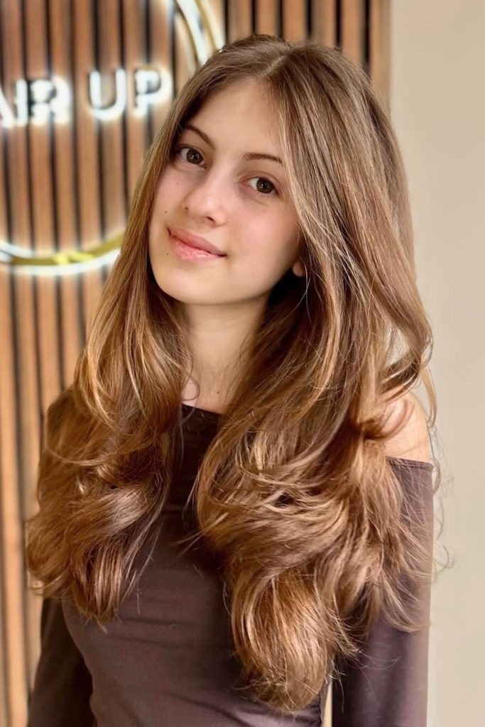Thick Hair With Blended Long Layers and Side Bangs