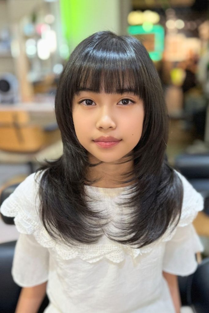 Butterfly Haircut With Wispy Bangs