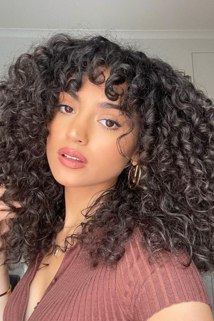 Curly Hair With Bangs for Round Faces
