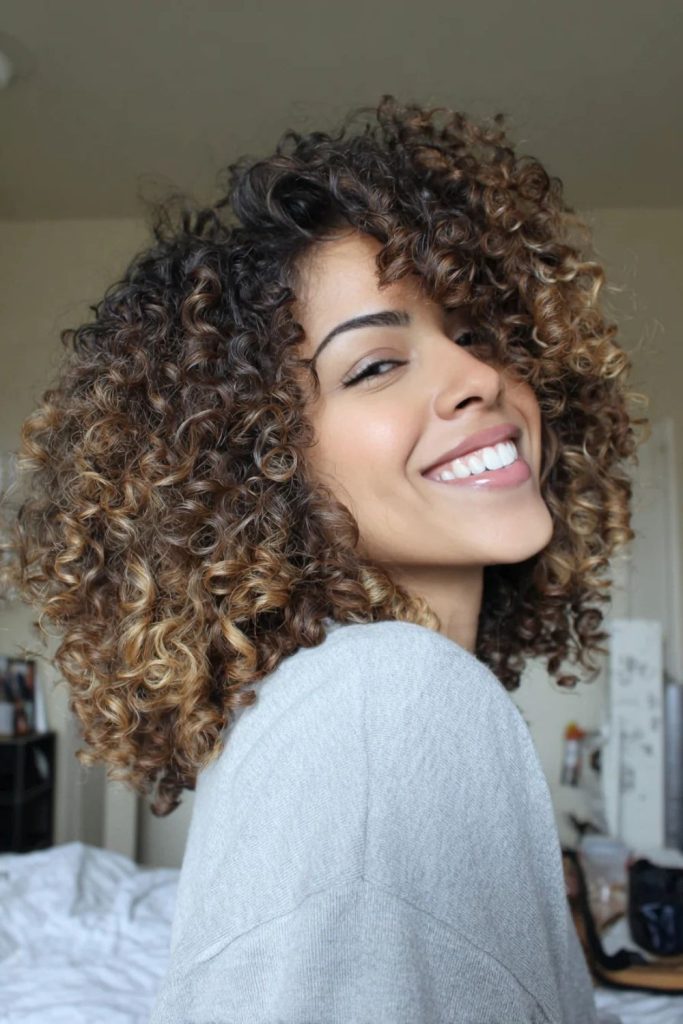 Shoulder-Length Wavy Curly Haircut